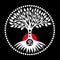 Tree of life against the red sun in circle mandala on a black background.