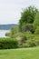 Tree lined shore of lake washington in early fall during midday