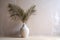 tree palm concrete sunlight wall shadows decor design house interior home vase. Generative AI.