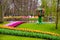 Tree statue with colorful birds in Keukenhof park, Lisse, Holland, Netherlands