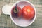 Tree tomatoes in white bowl shot from above