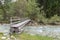 Tree trunk bridge over a Creek in the Twengtal in Lungau, Austria