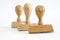 Tree wooden rubber stamps in a row