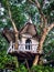 Treehouse for kids in the garden. Playhouse.