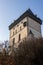 Trees in front of highest tower of Karlstejn castle