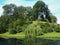 Trees on a hillside by a lake in Yorkshire, England