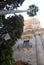 Trees and a historic building in downtown Malaga in Spain