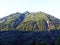 Trees and mixed forests on the slopes of the mountain range Glarus Alps