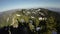 Trees and Mountain Peaks in Canadian Landscape in Spring Season. Aerial View. Dynamic Flying