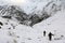 Trekker on Annapurna base camp trail in winter.