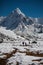 Trekker approaching Amadablam mount in Khumbu valley on a way to