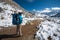 Trekker approaching Amadablan mount in Khumbu valley on a way to