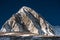 Trekker approaching PumoRi mountain in Khumbu valley on a way to