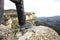 Trekker boot in the top of a cliff in the mountain