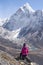Trekker enjoy view of Ama Dablam mountain on top of Nangkart Shank view point, Himalayas mountain, Nepal