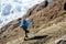 Trekker in front of Manaslu glacier on Manaslu circuit trek in N