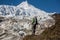 Trekker in front of Manaslu glacier on Manaslu circuit trek in N