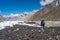 A trekker looking to Paiju mountain peak in K2 base camp trekking route, Karakoram mountain range in Gilgit Baltistan, Pakistan