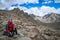 Trekker in the mountain valley near Mount Kailash