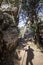 Trekker shadow walking by Torcal Natural Park trails, Spain