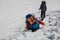 Trekker stuck in the hole in snow while crossing Cho La pass in