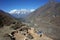 Trekker on the trail to Ama Dablam base camp, Nepal