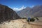 Trekker on the trail to Ama Dablam base camp, Nepal