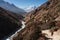 A trekker walking on trail to Everest base camp in Himalaya mountains range, Nepal