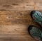 Trekking equipment on wooden background