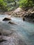 Trekking through the jungle. The turquoise waters of Rio Celese.