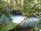 Trekking through the jungle. The turquoise waters of Rio Celese.