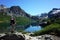 Trekking in Patagonia, Hiker with big backpack at Jakob lagoon in Nahuel Huapi National Park, Argentina. Hiking