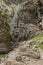 Trekking on a winding path through Imbros gorge near Chora Sfakion, island of Crete