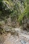 Trekking on a winding path through Imbros gorge near Chora Sfakion, island of Crete