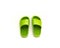 A trending cute pair of green open toe pillow slide sandals for toddler non-slip foam slippers isolated on white