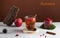 Trending photo of autumn or winter hot tea with spices, berries, apples. Autumn mood. Copy space