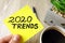 Trends 2020 text handwritten on sticky note