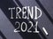Trends 2021 the word is written in white chalk on a dark surface