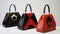 Trends Curve Handbag: Red, Black, And Patterned Sculptural Geometry
