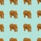 Trendy animals pattern made with wooden elephants  on bright light green background.