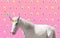 Trendy art collage. Beautiful unicorn on color background