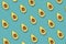 Trendy avocado  pattern on a green background