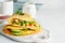 Trendy breakfast with quesadilla and eggs, trending food with omelet, cheese