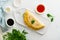 Trendy breakfast with quesadilla and eggs, trending food with omelet, cheese