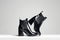 Trendy Chelsea black boots. fashion still life