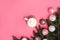 Trendy Christmas background of of hot chocolate with marshmallow, decorated Christmas tree branches with white, pink and