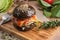 Trendy glossy burger with beef in black bun