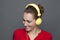 Trendy headphones concept for beautiful 20s girl smiling