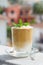 Trendy iced frothy ultra fluffy Dalgona instant Coffee drink