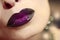 Trendy rich purple color lipstick.